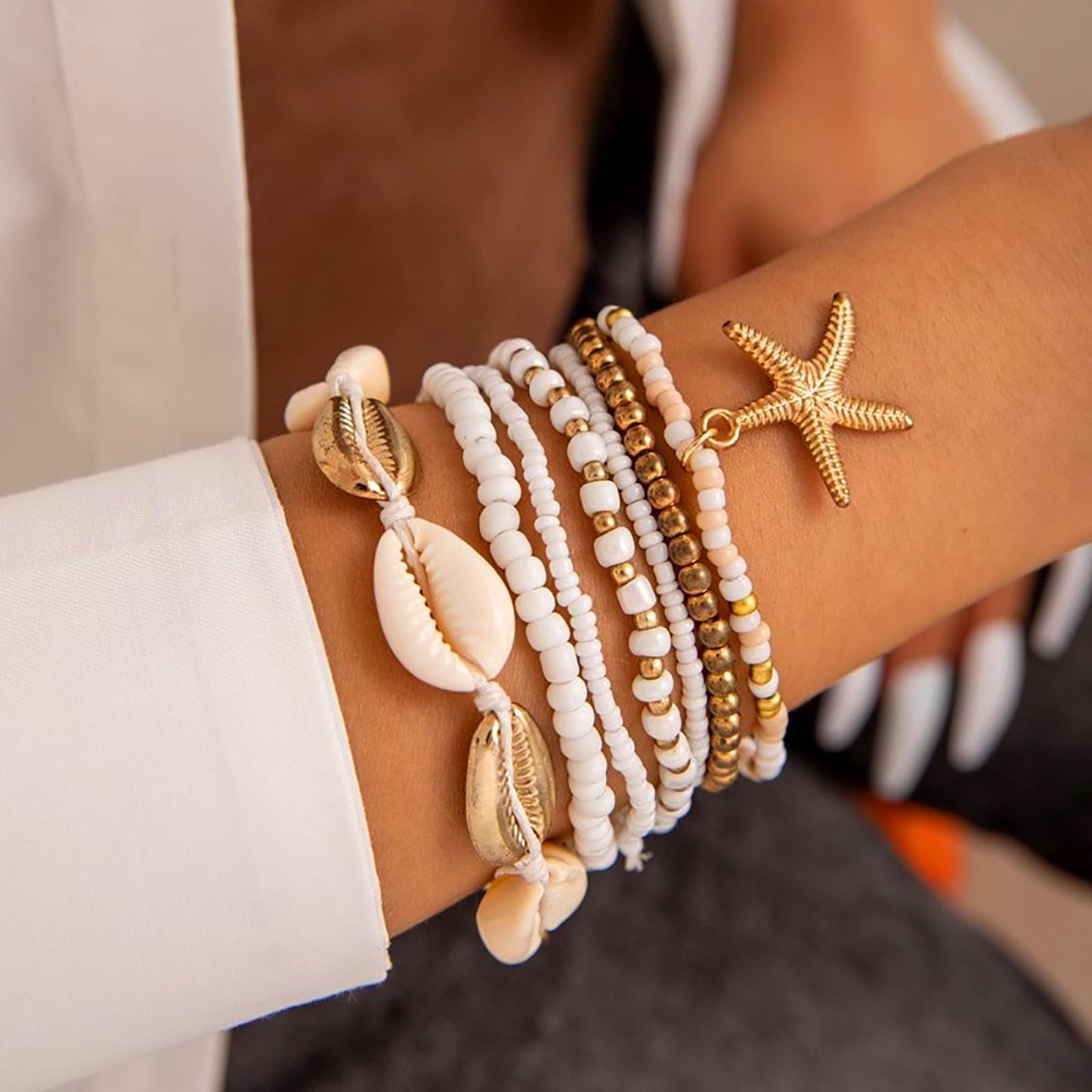 Strand Armband für Damen: 7-in-1 Style Schmuck mit Seesternen und Muscheln